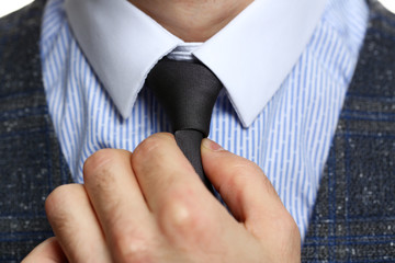 Male arm in blue suit set tie closeup. White collar management job serious move secretary student luxury formal interview executive agent marriage store corporate elegance employment preparation