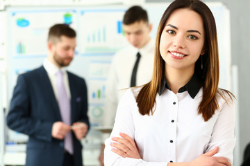 Beautiful smiling brunette clerk girl at workplace look in camera portrait. White collar worker at modern training coach visit boss job offer client profession market idea study