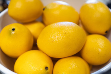 Fresh lemons in a bowl