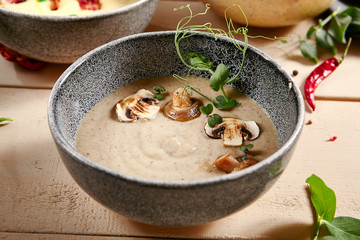 Forester soup with cheese rusks in gray bow