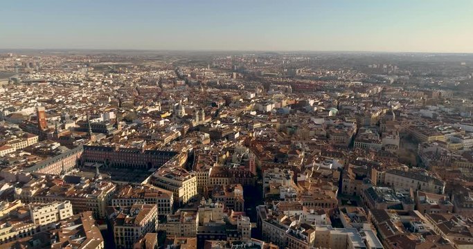 Aerial 4K footage of the famous Plaza Mayor is major public square in Madrid,Spain.Central Plaza Mayor in Madrid.Spain capital landmarks and the center Gran Via street and districts.��
