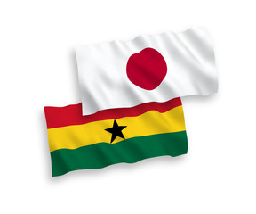 Flags of Japan and Ghana on a white background