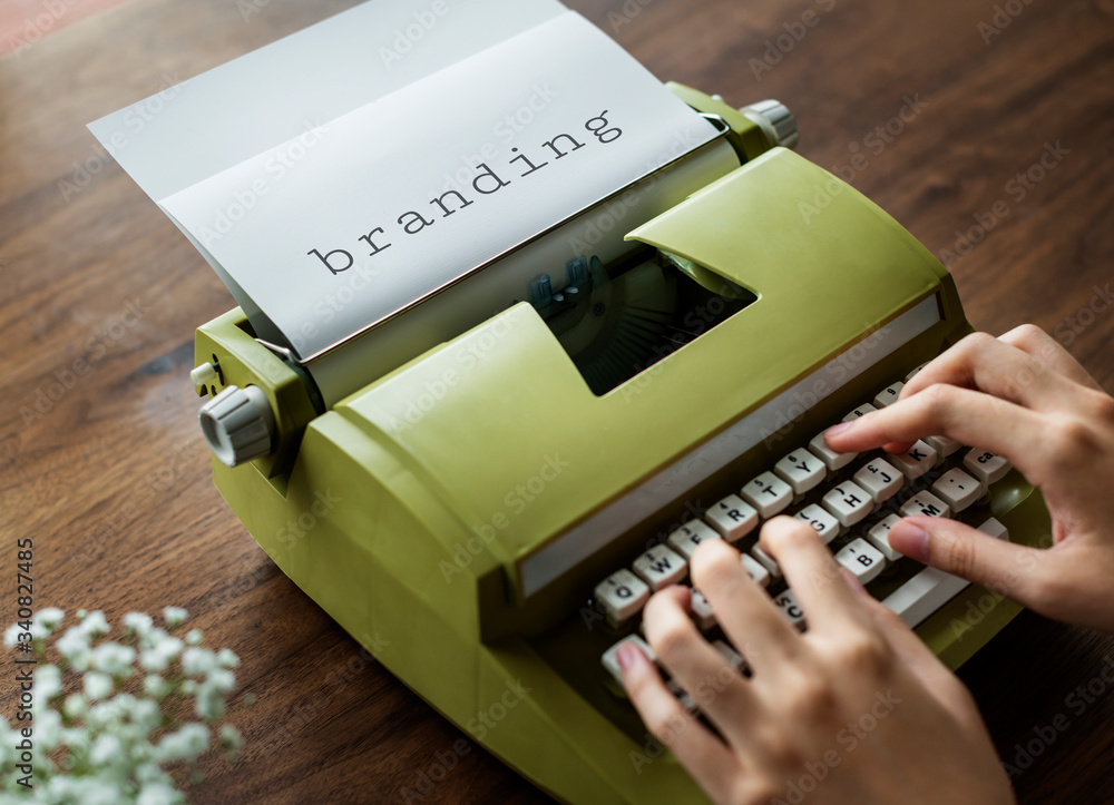 Poster aerial view of a man typing on a retro typewriter