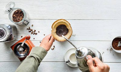Aerial view of people making drip coffee