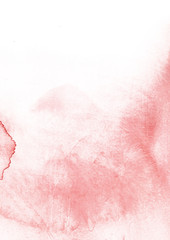 Watercolor coral background. Spots and drops of paint spread gently on the paper.