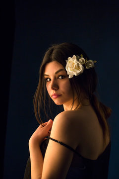 woman with white rose stdio shoot