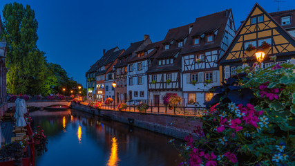 Fototapeta na wymiar Little Venice of Colmar at night. Little Venice is an area of well-preserved old town crossed by canals of the river Lauch.