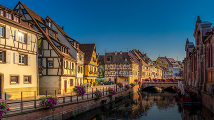 Colorful traditional french houses on the side of river Lauch in Petite Venise, Colmar, France