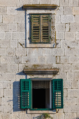 Fototapeta na wymiar Typical windows in coastal town Makarska, Croatia