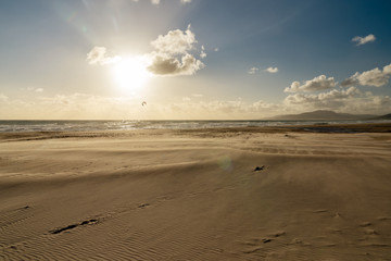 Windy sunset in Los Lances beach by the Atlantic Ocean. Tarifa is the southmost point of Europe, Cadiz Province, Andalusia, Spain, Europa.