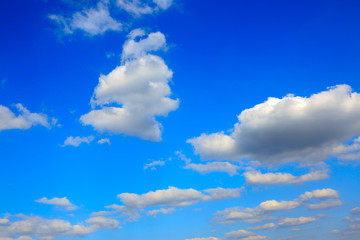 Clouds and blue sky background with copy space.
