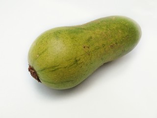 Vegetable - wax gourd. Scientific name - Benincasa hispida. The plant is a vine grown for its very large fruit, eaten as a vegetable when mature. Also known as ash gourd, white gourd,winter gourd.