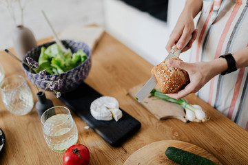 Pregnant woman making breakfast