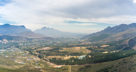 Fototapeta na wymiar Epic mountain valley landscape with rural town