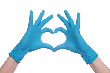 Heart of hand in medical gloves isolated on white background