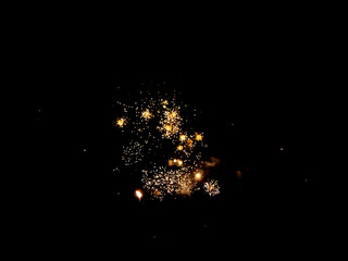 Colorful fireworks on the black sky background.