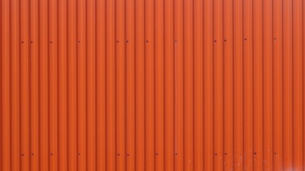 bright orange corrugated metal fence