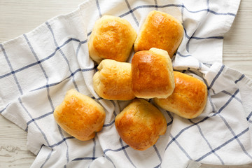 Home-baked Beef Russian Bierocks on a white wooden surface, top view. Flat lay, overhead, from above.