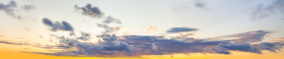 Fototapeta na wymiar Blue sky clouds background. Beautiful landscape with clouds and orange sun on sky