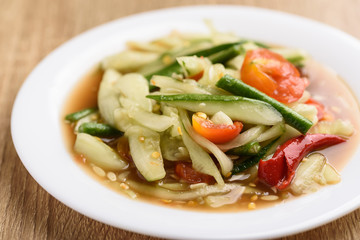 Spicy cucumber salad on white plate, Delicious Thai food