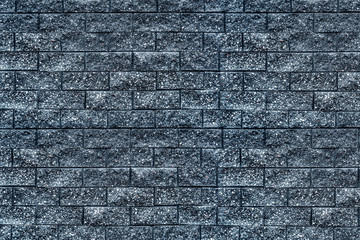Dark blue brick wall