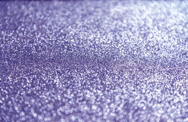 abstract defocused lights, sparkling holiday bokeh background in purple tones, elegant Christmas backdrop