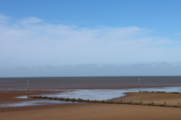 Old wooden groynes on the beach at Hunstanton Norfolk UK