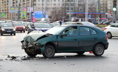 A crashed car after an accident on the road, ulitsa Kollontai, Saint Petersburg, Russia, January 2020