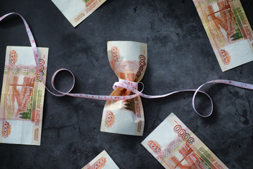 Business concept. The depreciation of the national currency. Bill with the inscription 