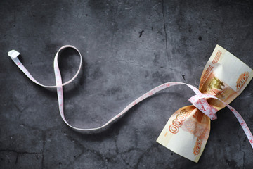 Business concept. The depreciation of the national currency. Bill with the inscription 