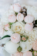 wedding delicate pink bouquet with a ring inside closeup