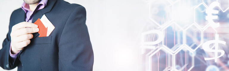 Financial crisis. Concept. Money bills in hand. Arrow symbol of the fall of the national currency. The change in the exchange rate between the Russian ruble and the US dollar.