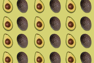 delicious avocados patterns on green background