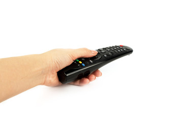 black remote control in hand isolated on white background