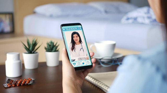 4K. sick quarantine patient use remote vdo conference, make online consultation with doctor on mobile application about illness, medication via video call. Telehealth, Telemedicine and online hospital