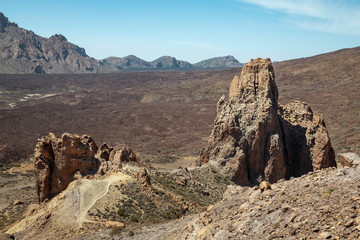 Peculiar Mars-like landscape as seen from the strategic viewpoint at Llano de Ucanca, revealing igneous rocks, solidified lava and volcanic ash, at Teide National Park, Tenerife, Canary Islands, Spain