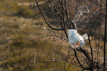 Abandoned and dirty white mask with filter