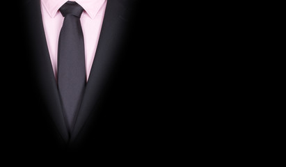 Man in a black suit, close-up