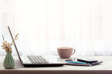 Design Office Workplace with laptop and copy space working from home.