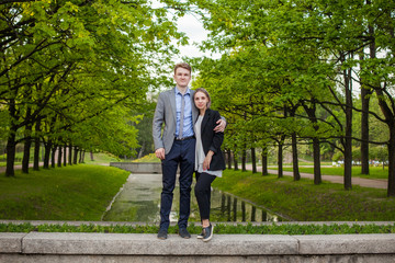 Young people. Boy and girl together in park