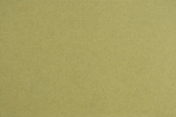 Background and texture of empty brown color paper sheet, on horizontal view.