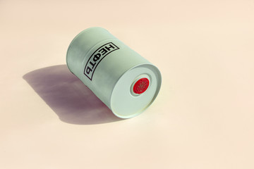 Metal barrel of oil with text 