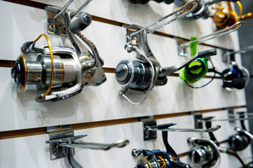 A variety of fishing reels. Fishing gear and accessories.