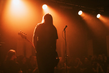 Bassist playing on stage