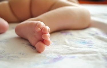 foot of little baby close up