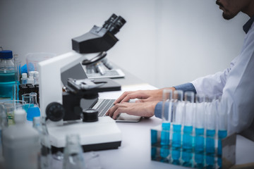 Medical scientists are analyzing data in the laboratory.