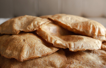 Fresh baked rye bread. Sliced homemade bread. Rye tortillas and pita bread. Organic healthy food....