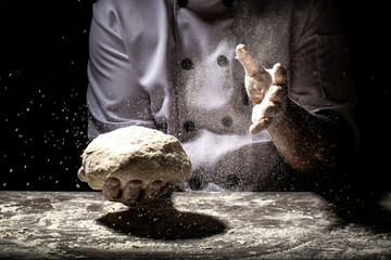 chef prepares the dough with flour to make the bio Italian pasta. concept of nature, Italy, food,...
