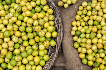 two baskets with oranges seen from above