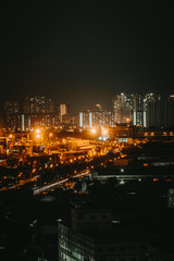 Urban night skyline panoramic view of Ho Chi Minh city. Ho Chi Minh City with development buildings, transportation, energy power infrastructure. View from District 7, Saigon. High resolution 